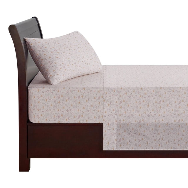 Mainstays Kids 100% Cotton Sheet Set in light beige with small sun, rainbow, and cloud prints, fitted on a dark wood twin bed frame with a curved headboard, made from breathable 180 thread count percale cotton, suitable for mattresses up to 12 inches deep and ideal for adding cozy style to kids' bedrooms.