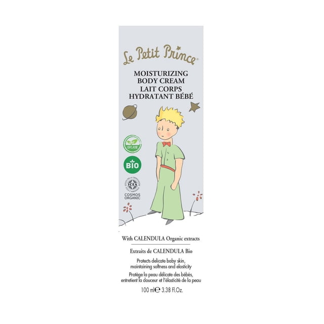 Le Petit Prince Moisturizing Body Cream packaging featuring the Little Prince character in a green outfit with a red belt and bow tie, with stars and a planet illustration. The label highlights organic calendula extracts and states it protects delicate baby skin while maintaining softness and elasticity. The product volume is 100 ml (3.38 fl oz).