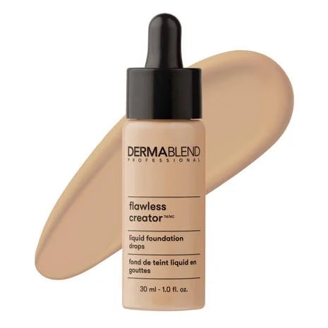 Dermablend Flawless Creator , Fond de Teint Léger 40N, une Bouteille de 30 ml de Gouttes de Fond de Teint Liquide avec un Bouchon Compte-Gouttes, Exposée à Côté d'Un swatch de Fond de Teint beige. Cette Formule Sans Huile, Non Comédogène Offre une Couvrance Totale avec des pigments Purs et une Finition Naturelle. Convient au Mélange avec des Soins de la Peau pour une Couvrance Personnalisable.