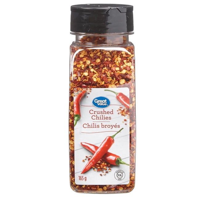 Great Value Crushed Chilies in a clear plastic container with a black lid, containing medium-heat crushed red chili flakes with seeds, labeled 165 g, ideal for seasoning curries, stir-fries, seafood dishes, and meat marinades, also suitable for sprinkling on grilled vegetables.