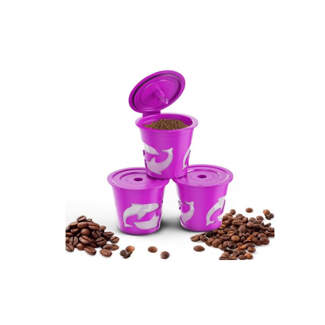FrostHike 3 Pack Keurig K-Cup Reusable & Refillable Coffee Filter Pods in vibrant purple with dolphin design, compatible with all Keurig 1.0 and 2.0 brewing systems. The image shows three pods stacked, with one open and filled with ground coffee, surrounded by coffee beans.