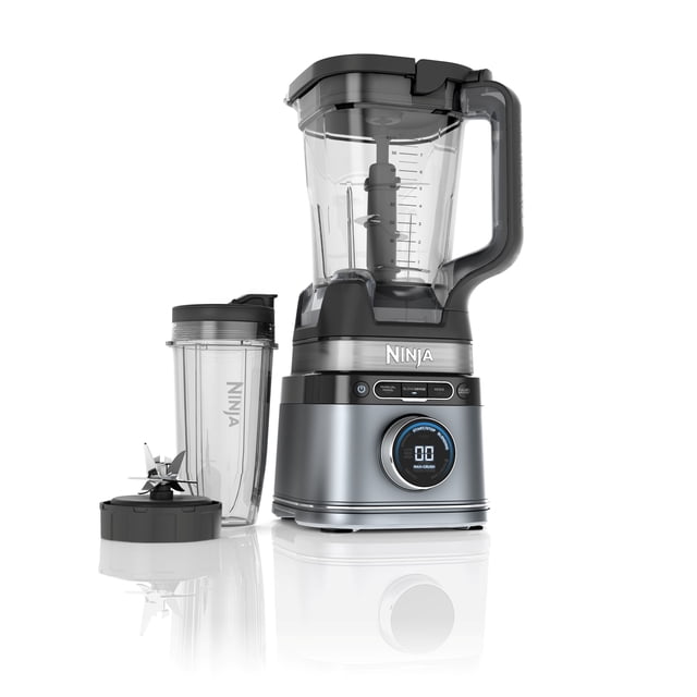 Ninja Detect Duo Power Blender + Single Serve with Blend Sense Technology in platinum silver, featuring a 72 oz. clear pitcher with measurement markings and black handle, digital illuminated dial on the motor base, 24 oz. single-serve cup with spout lid, and detachable blade assembly, suitable for crushing ice, blending smoothies, and chopping ingredients with preset programs.