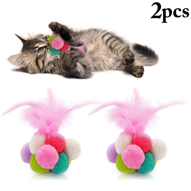 2PCS Cat Ball Toy Interactive Bell Cat Pompom Toy featuring multicolored plush balls with pink faux feather accents. Includes two toys, each designed to attract cats' attention and encourage play. Dimensions: Pink feather toy measures 18.3x7cm (7.2x2.76in), white feather toy measures 14.7x7cm (5.79x2.76in). Ideal for indoor or outdoor use to train and exercise cats.