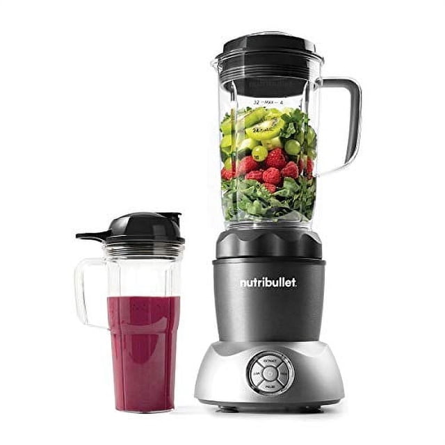 Nutribullet Select 2.0 1000 Watts Personnel Blender avec une base Argent Compacte Comprenant un Cadran de Contrôle pour des options Polyvalentes de Mélange et l'Extraction de Nutriments. Comprend Deux Gobelets de Mélange : l'Un Rempli de fruits et de Verdures Frais, et l'Autre Contenant un smoothie vibrant. les Deux Gobelets Ont des Couvercles Noirs pour Plus de Commodité.