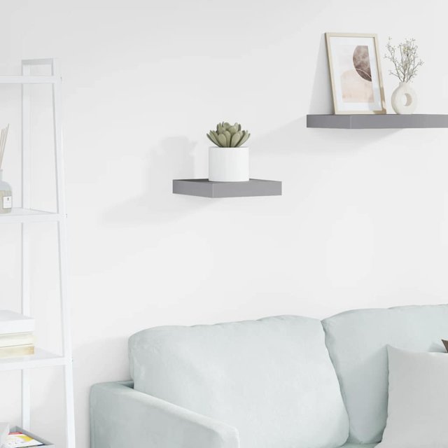 vidaXL Floating Wall Shelf in grey, measuring 23x23.5x3.8 cm, made of honeycomb MDF and metal. The shelf features an invisible mounting system and is displayed in a modern living room setting. It holds a small potted plant and decorative items, showcasing its suitability for awards, books, or ornaments. Maximum load capacity is 5 kg.