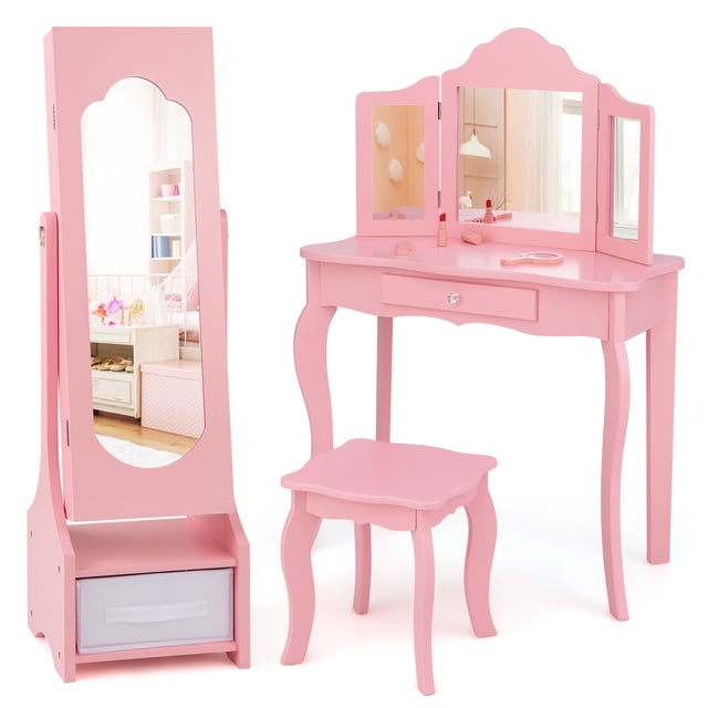 Costway Kids Vanity Set Princess Makeup Dressing Table & Chair Set with Jewelry Armoire in pink. The set includes a tri-folding mirror vanity table with a detachable top, a matching stool, and a jewelry armoire cabinet with a full-length adjustable mirror. The armoire features 18 earring slots, 13 hooks for bracelets and necklaces, 64 ring slots, 3 storage shelves, 2 drawers, and 1 foldable fabric drawer. The vanity table has a spacious tabletop and a built-in drawer for additional storage. Designed with safety in mind, the set includes anti-toppling devices and a sturdy triangle structure. Made from MDF, glass, and pine, this set is perfect for kids' bedrooms or playrooms.