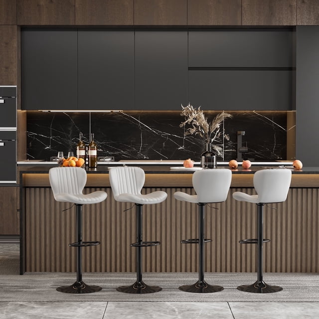 Walsunny Adjustable Bar Stools Set of 4 in beige PU leather upholstery, featuring swivel counter-height seats with scalloped design, adjustable height, and large bases. Positioned in a modern kitchen setting with a marble countertop and wooden paneling.