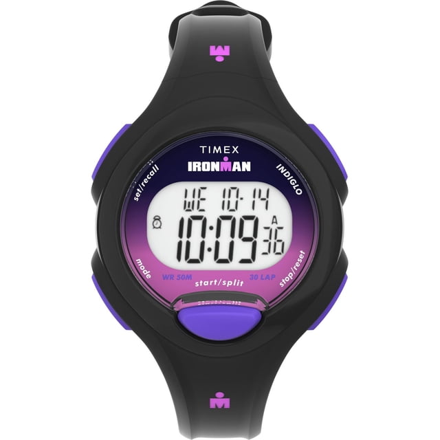 Timex Ironman® Essential 30 34mm Resin Strap Watch with a slim black resin case and black polyurethane strap featuring purple buttons, digital display showing time 10:09 and date Wednesday 10/14, equipped with countdown and workout timers, INDIGLO night-light, 30-lap stopwatch, and water resistance to 50 meters, ideal for sports and fitness use.