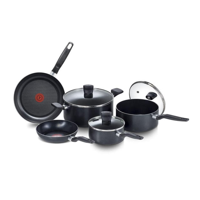 T-fal Essential 8PC Cookware Set with two black frying pans featuring Thermo-Spot heat indicators, two black saucepans with glass lids, and a large black pot with a glass lid, all with scratch-resistant non-stick surfaces, stainless steel trim, and riveted Bakelite handles, compatible with all cooktops except induction.