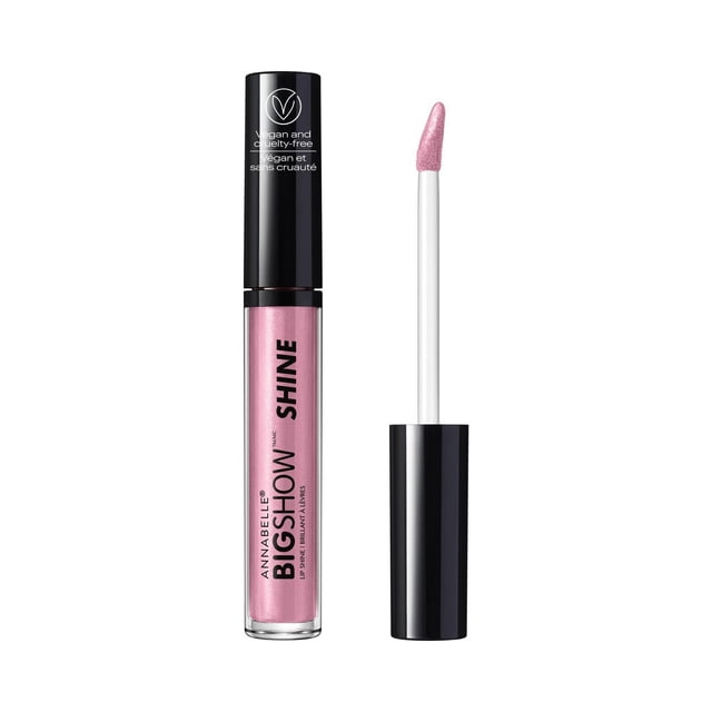 Annabelle Bigshow Lip Shine in a clear tube with black cap, showing shimmery pink gloss and applicator wand with slanted tip, featuring vegan and cruelty-free label. This hydrating, non-sticky lip gloss contains antioxidants for smooth, soft lips.