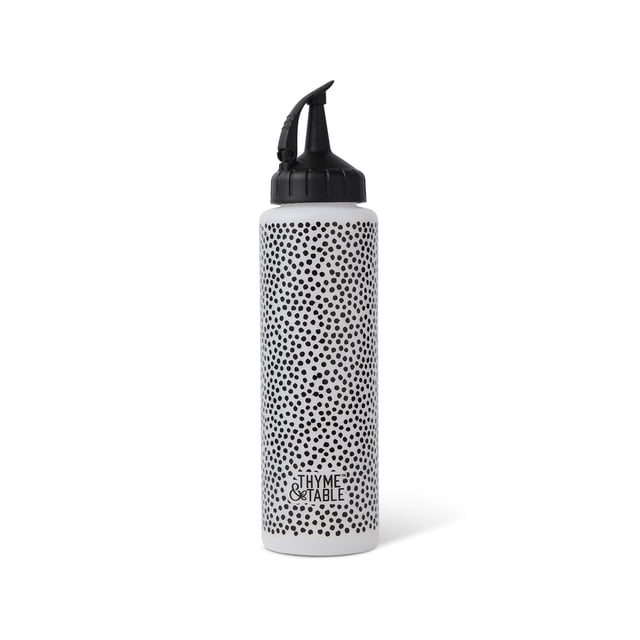 Thyme & Table 12 oz squeeze bottle with drip-free nozzle, white with black dot pattern and black flip-top cap, made from food-safe plastic for precise dispensing of sauces, dressings, oils, and vinegars, suitable for kitchen organization and food storage.