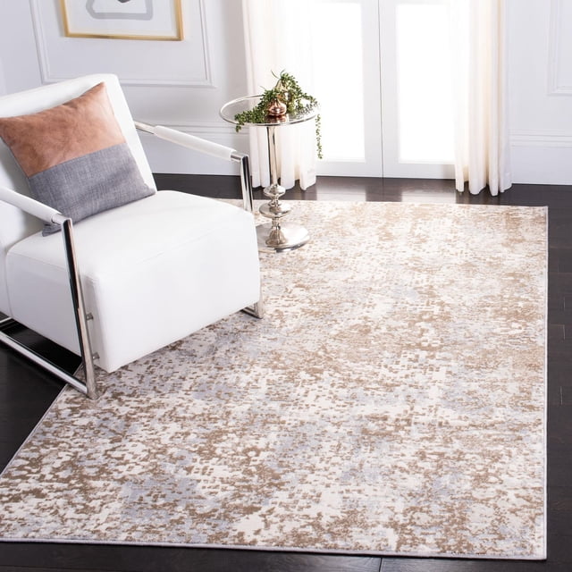Safavieh Lagoon Lance Abstract Area Rug featuring beige and light blue abstract patterns with a subtle textured finish in a plush cut pile, power loomed from soft synthetic yarns. Displayed on dark hardwood floors beneath a white modern armchair with chrome frame and a two-tone pillow, next to a silver round side table with greenery, suitable for enhancing modern accent rug décor.