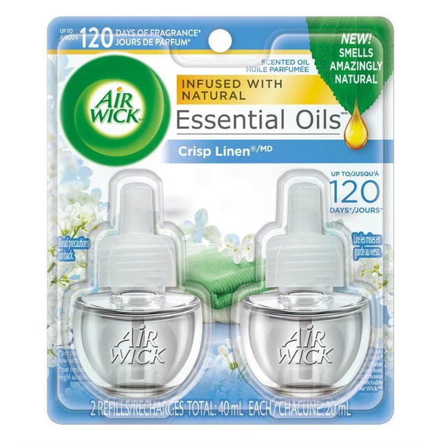 Air Wick Plug-in Air Freshener, Scented Oil Refills, Familiar Favourites: Snuggle, 2 Refills centered front view of two labeled refill bottles with pale amber oil; notes continuous diffusion, compatible plug-in warmers with Easy Adjust five fragrance levels, up to 45 days per refill (low setting); suitable for bedrooms, bathrooms or freshening linens and small closets.