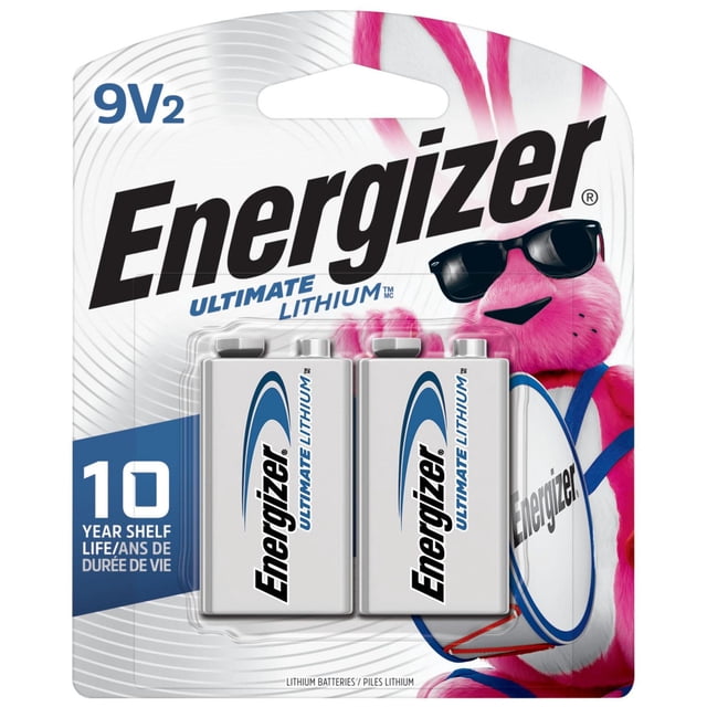 Energizer Lithium 9V Batteries (2 Pack) with two silver 9-volt lithium batteries featuring blue and black Energizer Ultimate Lithium branding, packaged on a white and silver blister card with the pink Energizer Bunny wearing black sunglasses and holding a drum, highlighting 10 year shelf life and long-lasting lithium power.