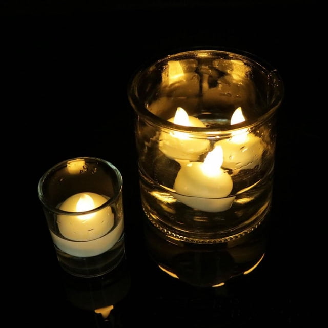12 Pack Realistic and Bright Flickering Bulb Battery Operated Flameless LED Tea Light for Seasonal and Festival Celebration Pack of 12 Electric Fake Candle Yellow light