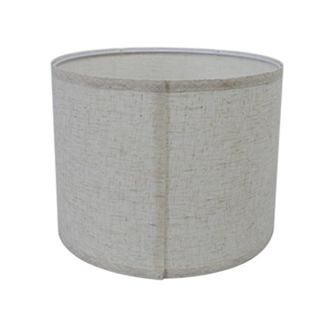 Drum lamp shade cylinder hand crafted from natural linen in a modern classic design. The durable fabric lampshade features a light grey color with a subtle texture, creating a soft and diffused light. Measuring 260mm x 180mm (10.24 x 7.09 inches), it is suitable for table lamps in bedrooms, living rooms, hallways, or hotels. Easy to install and replace, this lampshade adds a rustic yet stylish touch to any space.