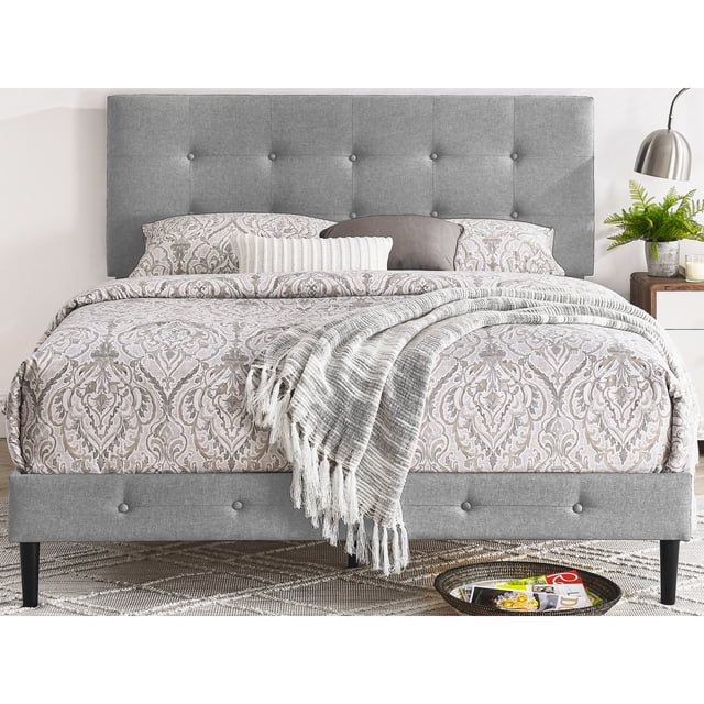 DeCoro Cambridge Upholstered Wooden Platform Bed Frame with Headboard, Queen size, shown in light grey fabric. The bed features a button-tufted headboard standing at 3.75 feet tall, upholstered in soft linen fabric, and supported by a durable metal frame with wooden slats for mattress support. The bed is styled in a modern bedroom setting with patterned bedding, a throw blanket, and a bedside table with a lamp and plant. Dimensions are 81.10 x 62.20 x 51.60 inches, and it supports up to 700 pounds.