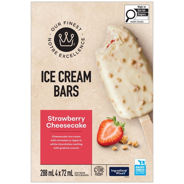 Our Finest Strawberry Cheesecake Ice Cream Bars package showing a bitten ice cream bar coated in white chocolate with graham crunch, a fresh halved strawberry, and granola pieces on a beige background, highlighting strawberry ripple cheesecake ice cream made with 100% Canadian dairy.