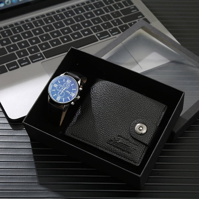Meitianfacai Fashionable Father's Day Business Gift Set for Men, including a black textured leather wallet with a button closure and a blue-faced wristwatch, elegantly arranged in a black gift box. Ideal for Father's Day, this high-end gift set is perfect for men who appreciate style and practicality. The set is displayed on a dark surface with a laptop in the background, emphasizing its suitability for business professionals.
