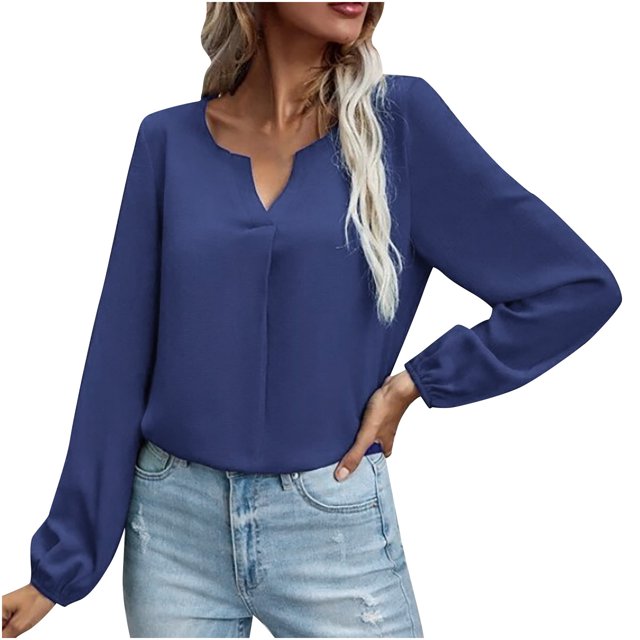 Womens Long Sleeve Tops and Blouses featuring a satin socket V-neck design in a solid blue colour. This casual and fashionable blouse has long sleeves with a relaxed fit, suitable for daily wear or work. Made from polyester, it is lightweight and comfortable, ideal for all seasons. Shown paired with light-wash jeans.