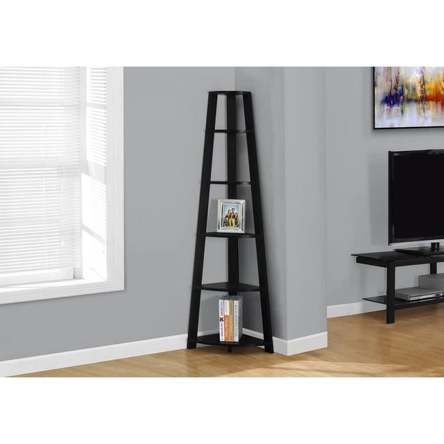 Monarch Specialties Inc Monarch Specialties Bookcase - Cappuccino, 72"H corner ladder shelf in black finish with five tray-style shelves, placed in a gray corner with hardwood flooring, holding a framed photo and books, near a window with white blinds and a black TV stand, ideal for corner storage and decor display.