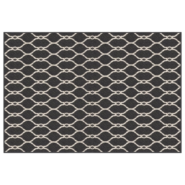 4x6' Sharaya Charcoal Printed Floor Mat with a white geometric karat pattern on dark grey polyester, featuring a latex rubber gelfoam backing for slip resistance, ideal as an area rug for small living spaces or a decorative entrance mat in mudrooms.