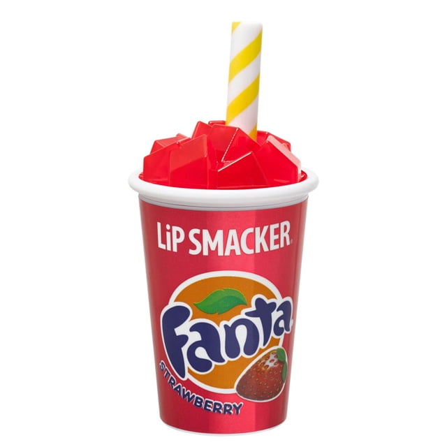 Lip Smackers Fanta Strawberry Cup Lip Balm in a red soda fountain cup with the Fanta logo and strawberry graphic, topped with red geometric ice cubes and a yellow and white striped straw, suitable for kids beauty gift sets.