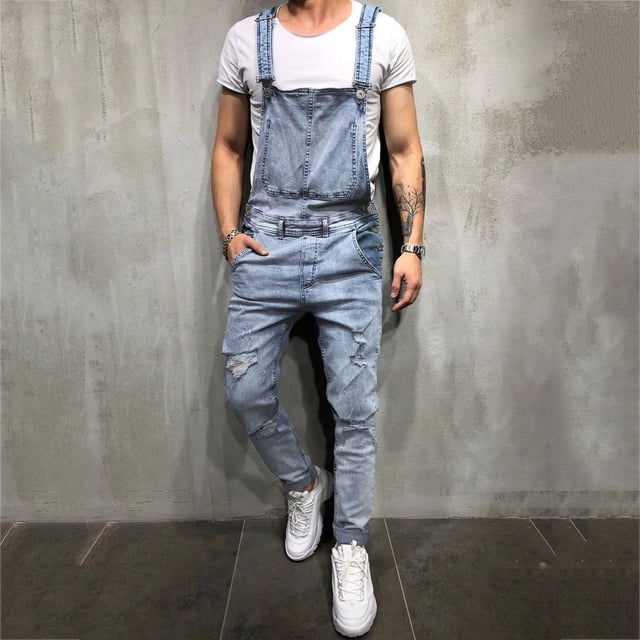 EGNMCR Men's Denim Bib Overalls with a washed and ripped design, featuring full-length pants, adjustable straps, and a relaxed fit. Crafted from durable denim material, ideal for men's casual fashion during autumn and winter. Includes functional details like multiple pockets and reinforced seams, styled with a white t-shirt and sneakers against a neutral background.