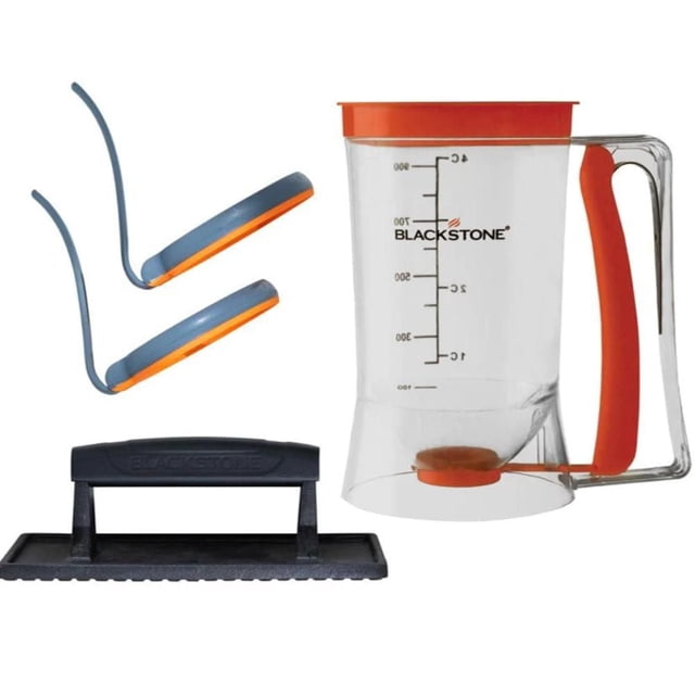Blackstone 4-Piece Professional Griddle Breakfast Kit with a clear 4-cup batter dispenser featuring an orange handle and lid, two silicone egg rings with blue and orange edges, and a black cast-iron griddle press with a rectangular handle, suitable for outdoor griddle cooking and breakfast tasks.