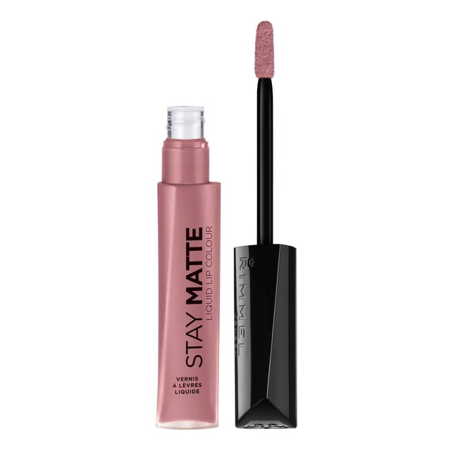 Rimmel London Stay Matte Liquid Lip Color in mauve pink with a velvety matte finish, displayed in a clear frosted tube with a black cap and applicator wand, providing long-lasting, kissproof liquid lipstick suitable for bold lip looks.