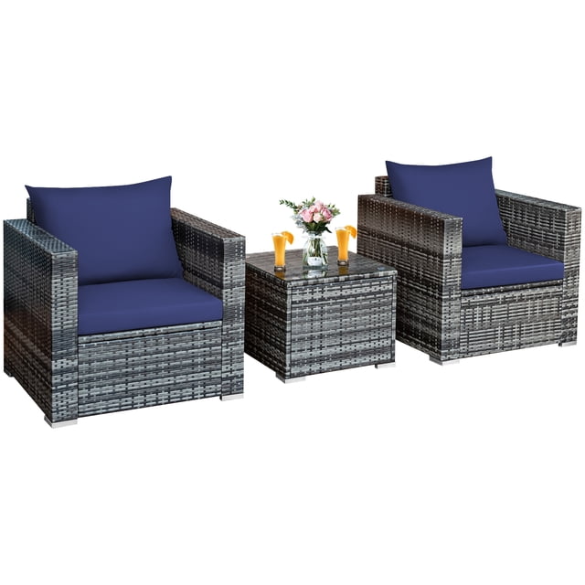 Patiojoy 3-Piece Patio Wicker Conversation Set Bistro Rattan Sofa Chair with Washable Cushion Navy. This outdoor furniture set includes two single sofas with mix grey rattan frames and navy cushions, and a square coffee table with a tempered glass top. The set is constructed with a sturdy steel frame and premium rattan, ensuring durability. The cushions are padded for comfort and feature removable, washable covers with zippers for easy cleaning. The coffee table offers space for drinks, snacks, or decor. Ideal for patios, gardens, balconies, or poolside relaxation.