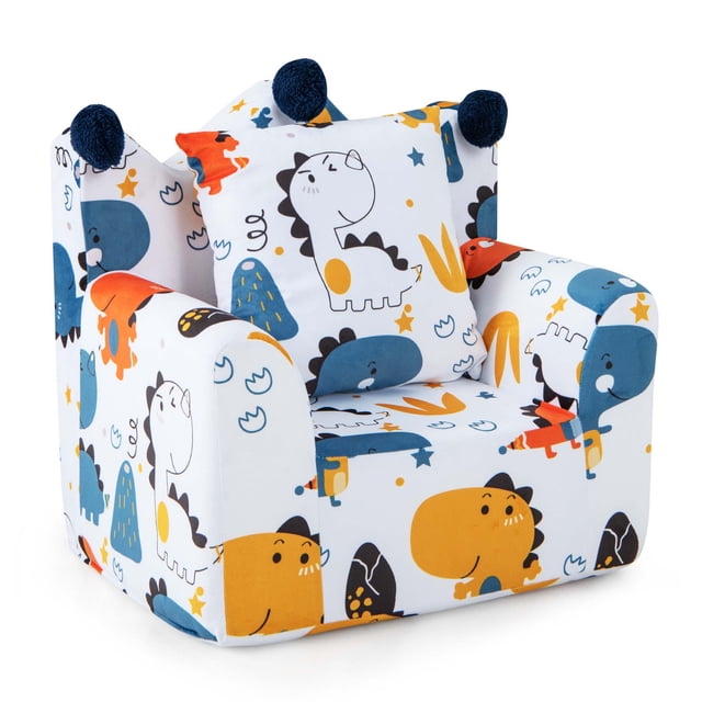 Costway Kids Sofa Chair Foam Filled Armchair Dinosaur Toddler Couch with Cover & Pillow. This toddler armchair features a crown-shaped design with fur ball accents and vibrant dinosaur patterns in multi-colour. Made with ultra-soft velvet and high-elastic sponge filling, it offers a comfortable seating experience for children under 5 years old. The chair includes a matching 14-inch square pillow and has a detachable, machine-washable cover for easy cleaning. Lightweight at 5 lbs, it is easy to move and requires no assembly. Dimensions: 23 x 18 x 22 inches.