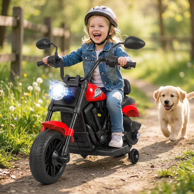 Gymax Moto pour Enfants en Rouge avec Phare DEL, Fonctions Musicales et Roues Stabilisatrices, Conçue pour les Enfants de Plus de 18 Mois. le Jouet à Chevaucher Est Montré à l'Extérieur sur un Sentier, avec un Enfant le Conduisant et un Chien Courant à Côté. la Moto Comprend un Guidon Facile à Saisir, une Pédale et des Roues Antidérapantes pour une Stabilité et des Promenades Fluides.