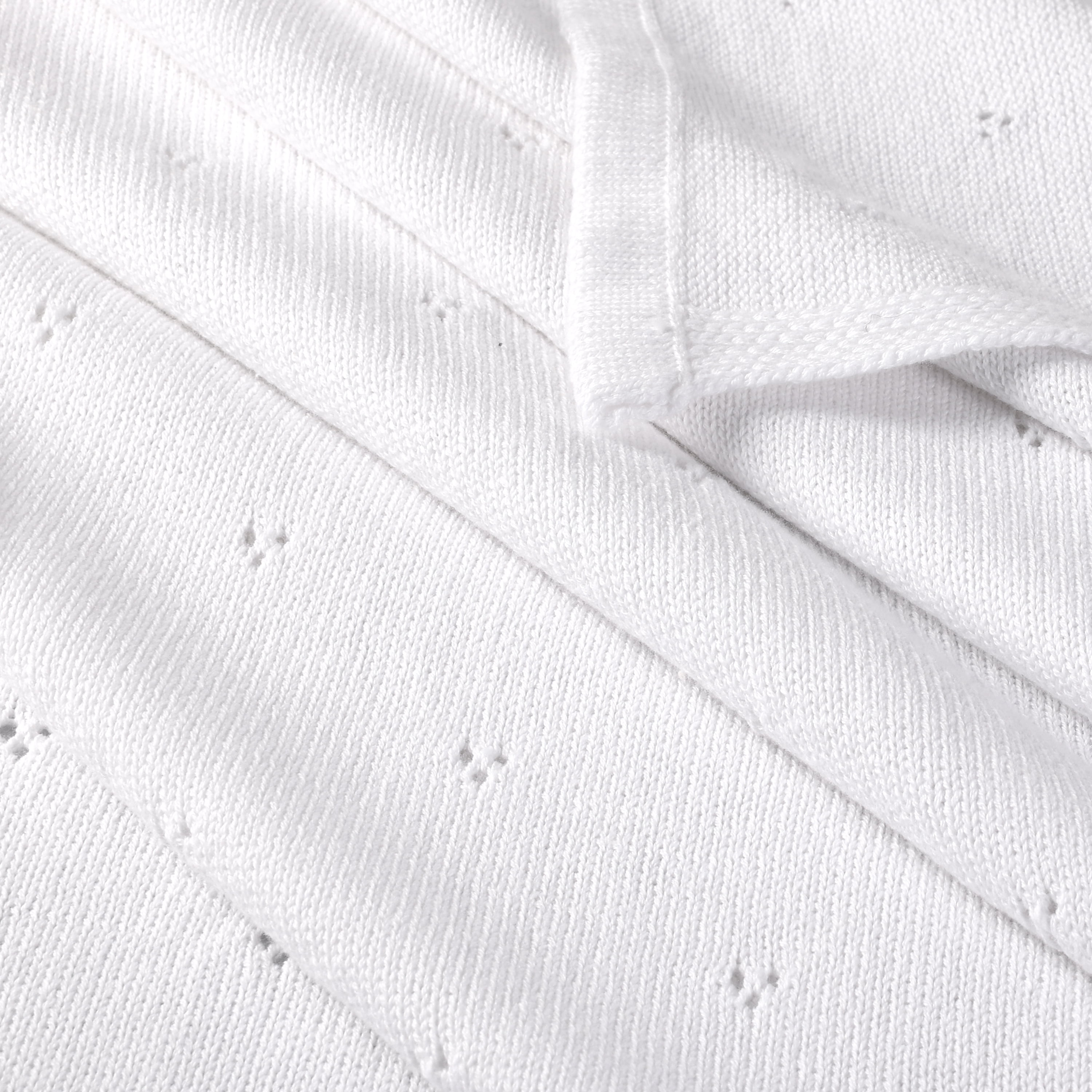 Couverture bébé en tricot de coton biologique blanc 76 x 102 cm