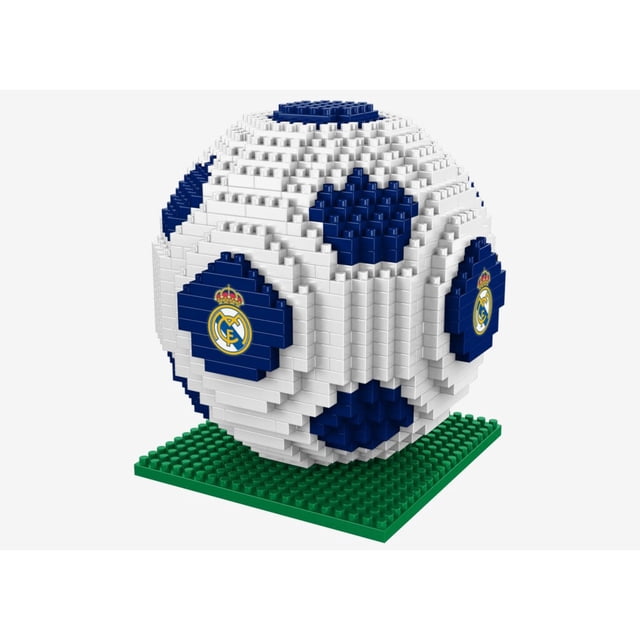 Real Madrid - BRXLZ 3D Soccer Ball Construction Kit with 696 building block pieces. The completed design features a pixelated soccer ball with blue and white patterns, Real Madrid team logo decals, and a green base. Approximately 10 cm x 9 cm x 9 cm when fully assembled. A fun building play set suitable for ages 12 and up.