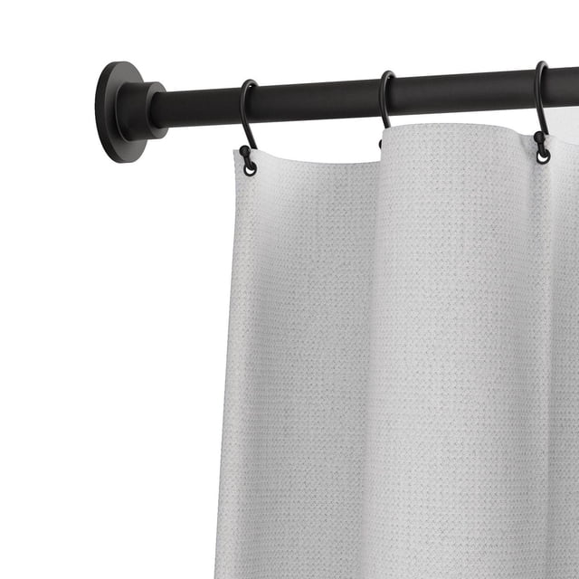 Mainstays Adjustable Tension Shower Curtain Rod with Decorative Finials in matte black finish, mounted with black rings holding a textured white shower curtain, featuring modern round finials and easy tension installation with no tools or drilling, ideal for standard or oversized showers and closets.