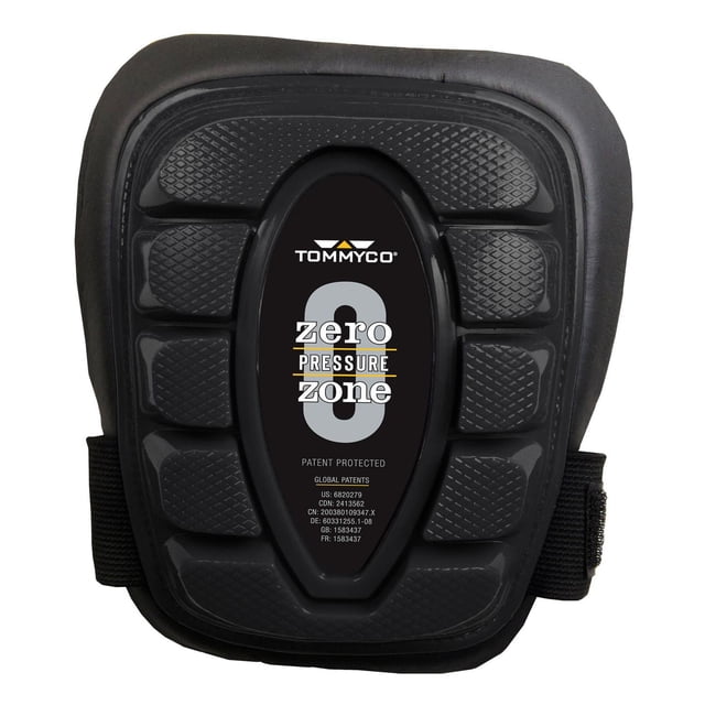 Tommyco T-Foam Flat Terrain Kneepads - 50010 with a black flat terrain cap featuring textured pressure-dispersing pads and a central label displaying the Tommyco logo and 'zero pressure zone' text, designed for pressure relief and stability, secured by a single elastic strap with hook and loop fastener, suitable for workwear knee protection.