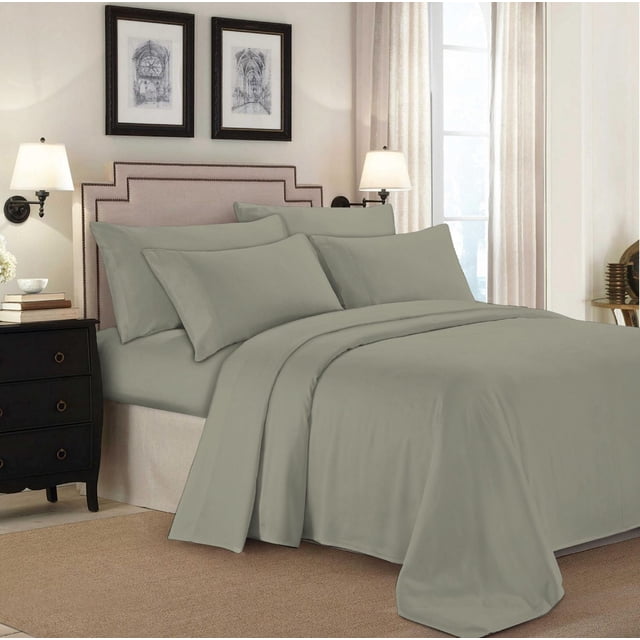 Johnson Home 500 Thread Count Certified Organic Cotton Sheet Sets in muted sage green on a bed with beige upholstered headboard with nailhead trim, paired with matching pillowcases, set in a bedroom with black nightstands, lamps, framed architectural prints, and light curtains, offering breathable, durable, and hypoallergenic bedding suitable for year-round comfort.