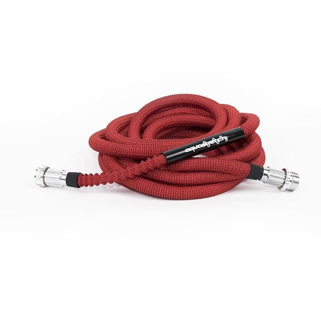 Prestige Series AquaStretch Expandable Hose, 50ft, coiled with a red polyester fabric cover and flexible latex core, featuring silver aluminum fittings and a black branded connector sleeve, ideal for garden watering, patios, and outdoor cleaning.