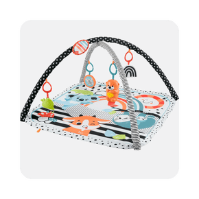 A colorful baby play gym with two crisscrossed arches, hanging toys, and a soft mat featuring animal illustrations.