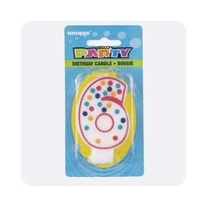 Number 6 birthday candle with colourful dots in packaging.
