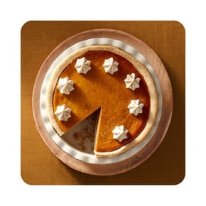 Pumpkin pie with whipped topping slice missing
