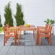 Ensemble de table et chaises à manger se composant de 5 pièces en bois pour patio extérieur Malibu avec Chaises Empilables – image 2 sur 7