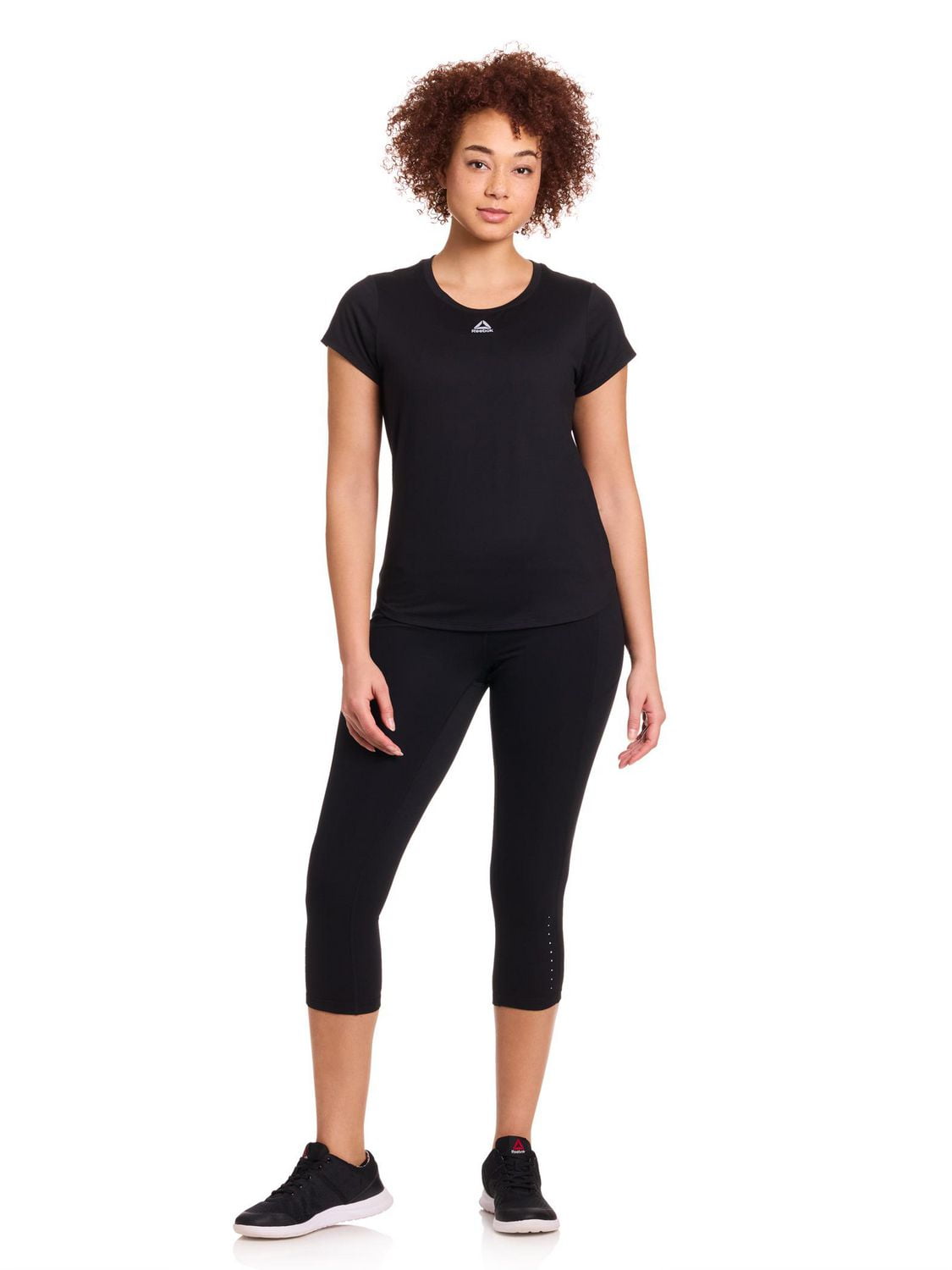Reebok Legging capri taille haute On the Run avec entrejambe de 20 po pour femmes avec poches