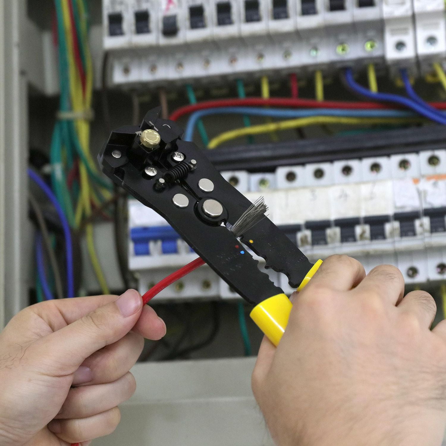 bare wiring on back of light switch in house being redecorated in