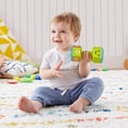 thumbnail image 2 of ​​Fisher-Price Laugh & Learn Countin' Reps Dumbbell - Bilingual Edition, 2 of 7