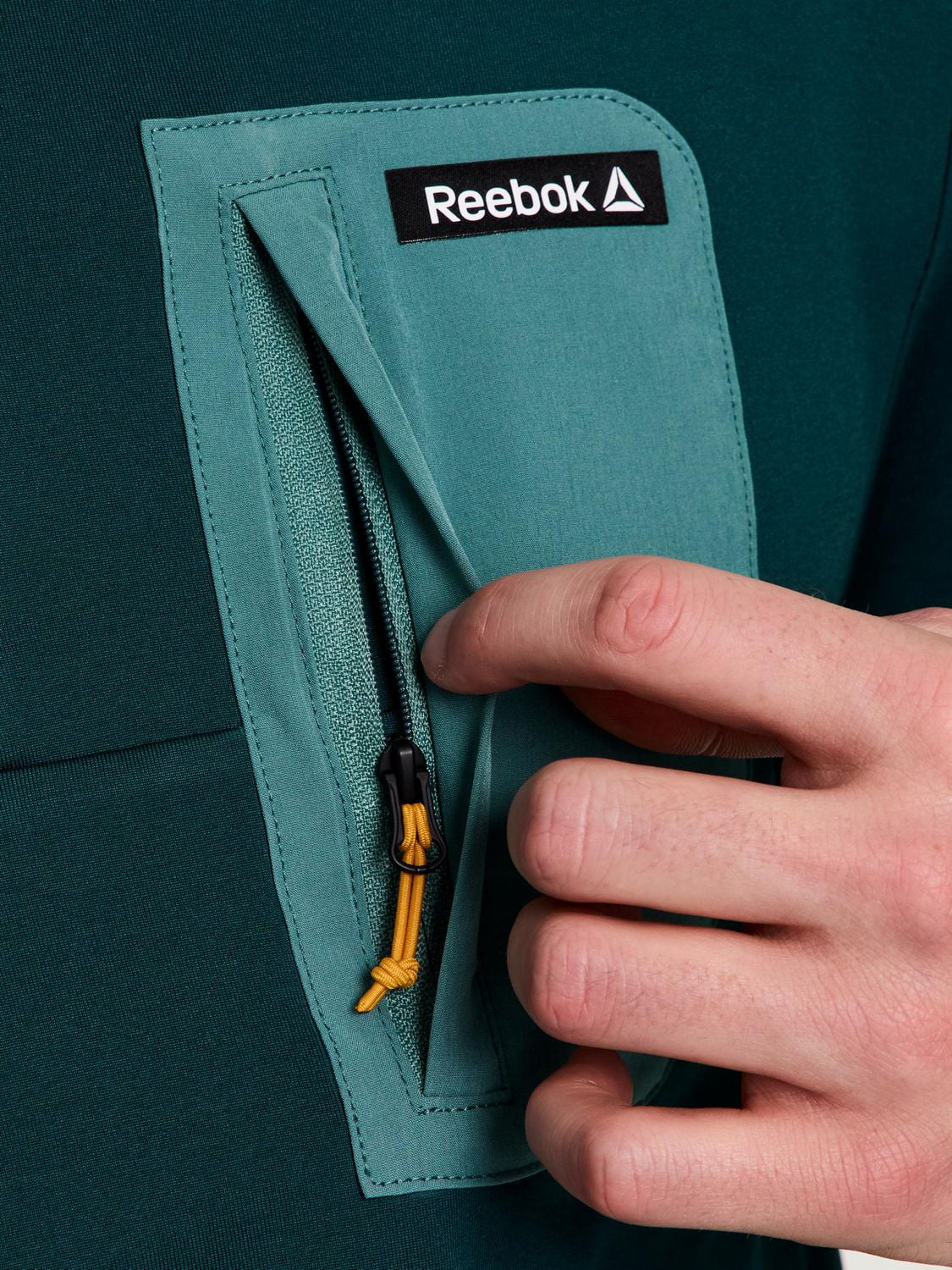 Reebok Pull à col montant et boutons-pression  freedom pour homme Tailles S-XL