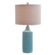 Lampe de table à base en céramique entourée d'une courtepointe bleue, Cresswell – image 1 sur 8