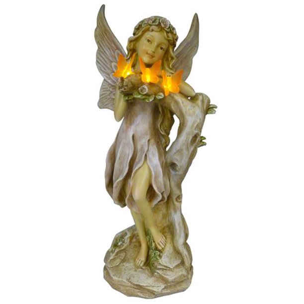 Statue solaire en forme de fée avec papillon