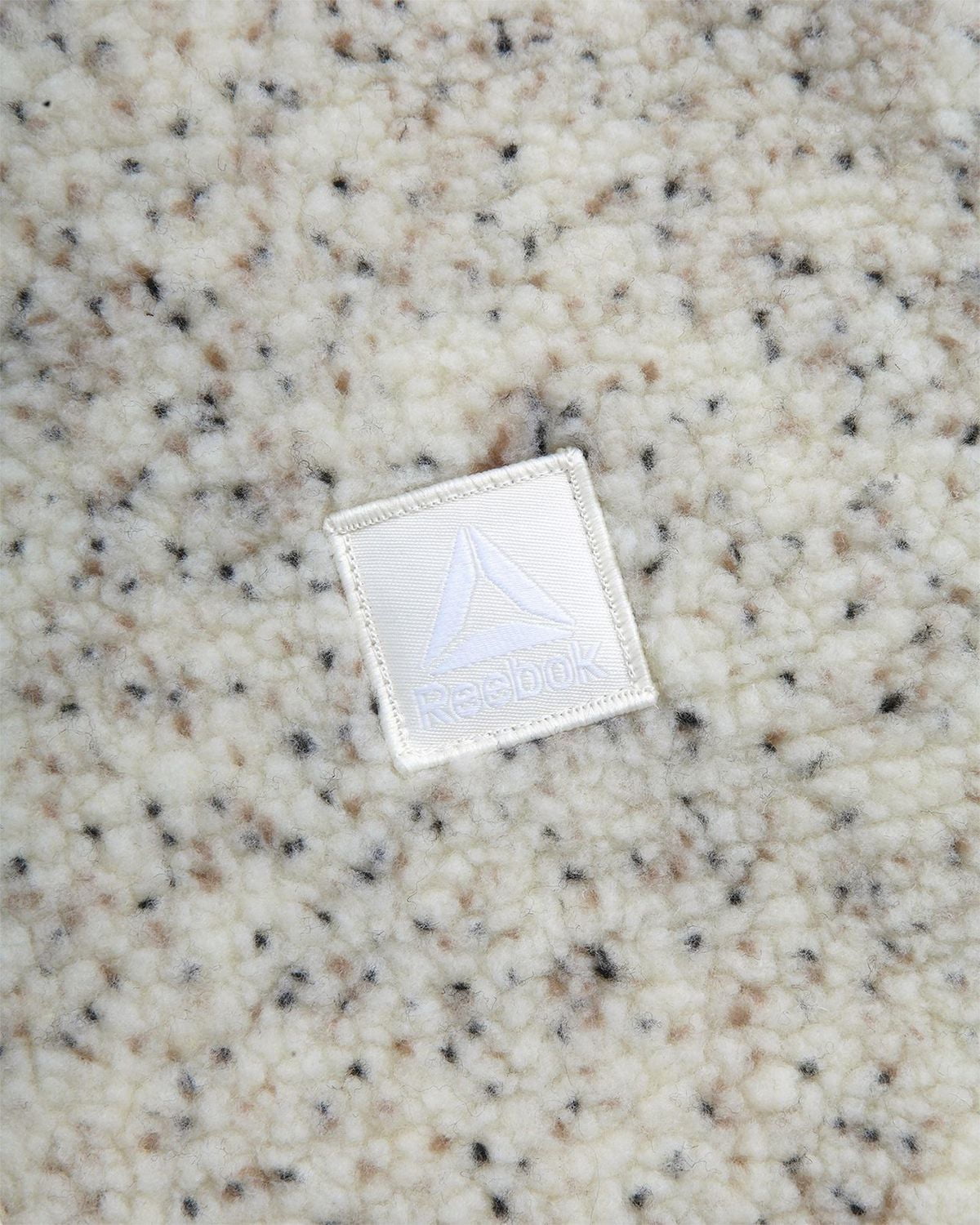 Veste pour femmes Reebok en mélange Sherpa et matelassé losanges